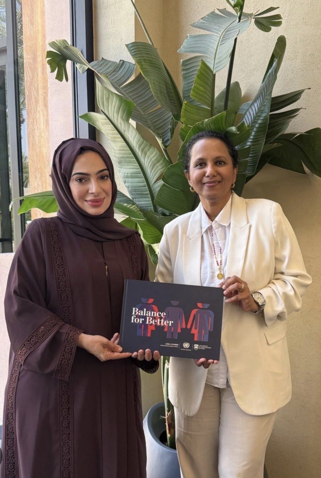 Lubna Qassim with Professor Payyazhi Jayashree and the book Balance for Better